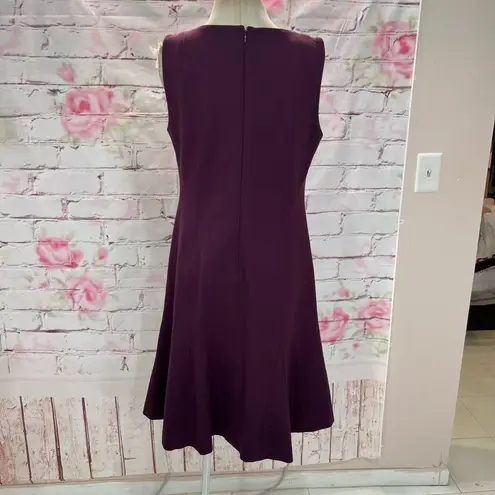 Carlisle New York sleeveless purple a line dress with zippers on pleats of hemli