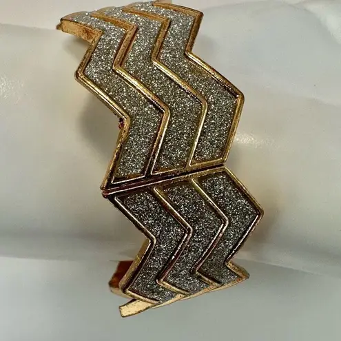 Gold tone rhinestone hinged bangle bracelet