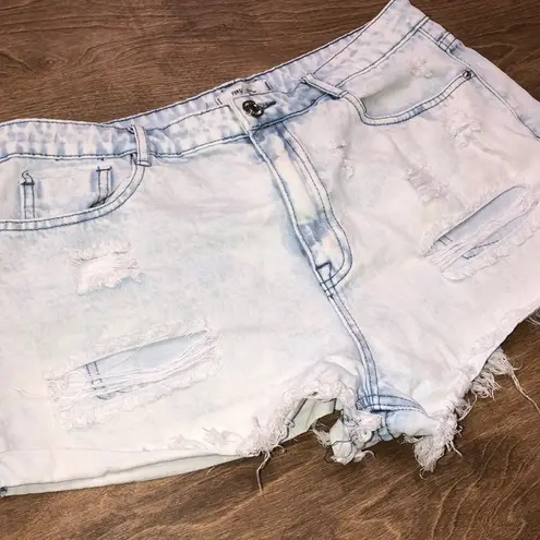 Forever 21  size 30 light wash distressed shorts