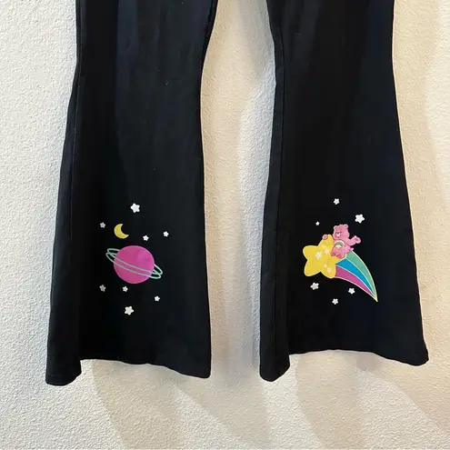 Dolls Kill  x Care Bears Planet Care Printed Flare Pants Black Size M