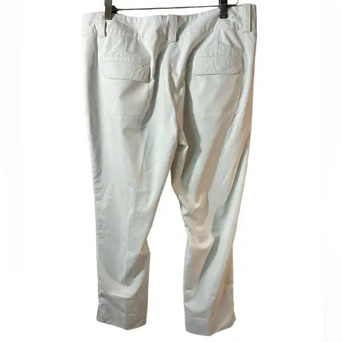 Nike  Women’s Dri-Fit White Golf Pants. size 12. zippered side pkts. EUC