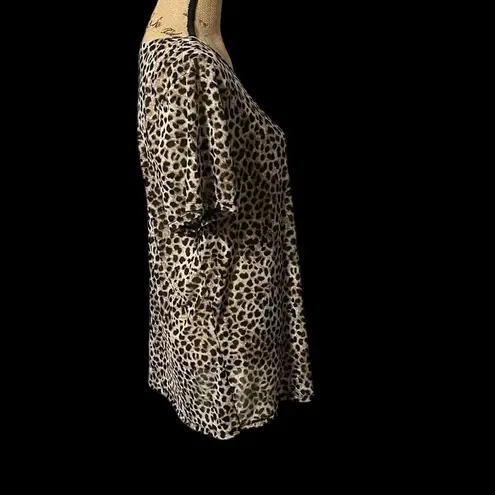 Torrid  size 3 semi-sheer cheetah print top. EUC.