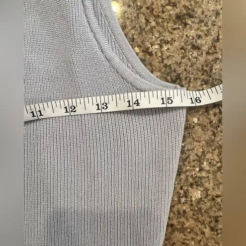 COMMENSE Asymmetrical Slit Knit Skirt Set
Color Blue Size Medium NWT Sleeveless