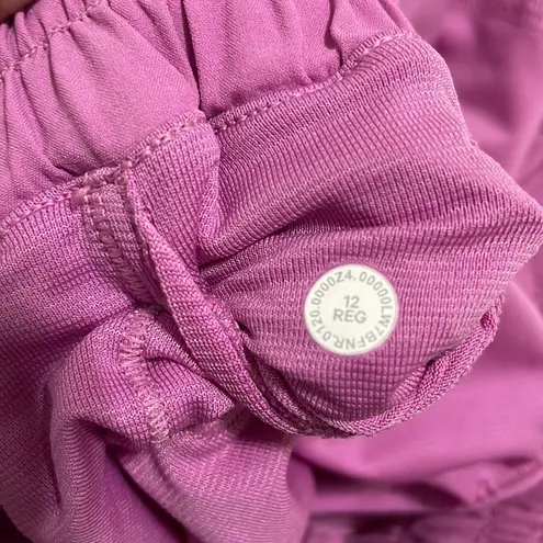 Lululemon  • magenta glow hotty hot shorts sz 12 - Image 9