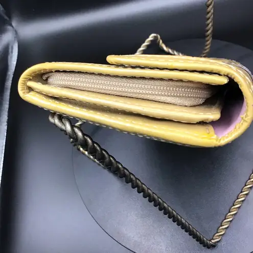 Coach  PENELOPE EMBOSSED BEIGE SIGNATURE SLIM ENVELOPE PATENT LEATHER