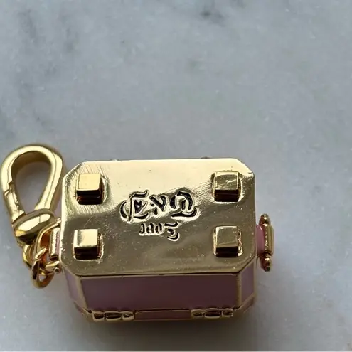Like new Juicy couture Gold and Pink Jewelry Box Charm