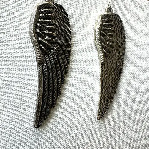 Silver tone angel wing earrings