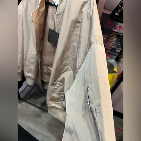Beige Bomber Jacket. Size large Tan