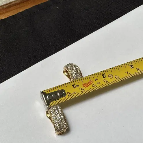 Roman Signed Rhinestone Gold Tone Clip On Earrings