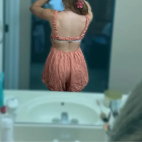 Francesca's Gently used Francesca’s open back romper. Size M.