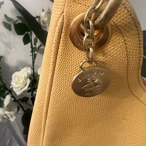 Brahmin yellow/white hobo style shoulder bag. Gold hardware.Rare light yellow