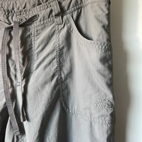 The North Face  zip off pants in grey size 12. Great Cond!