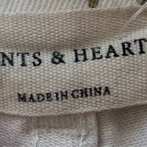 Saint & Hearts Boutique Cow Print Bell Botton Western Small Jeans. 2822