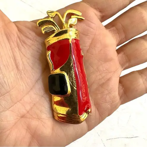 Gold tone red and black Golf bag with clubs pin