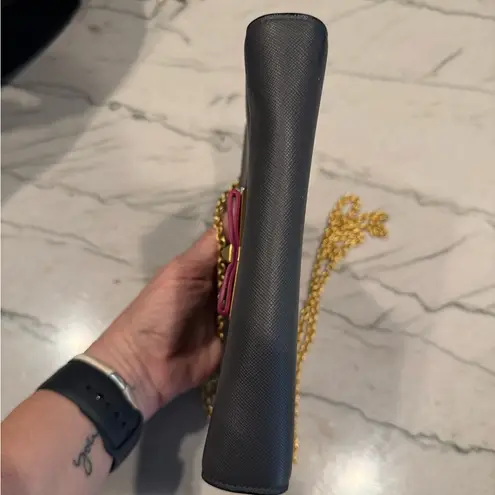 MCM Visetos Mina Crossbody Bag Dark Grey with a Pink Bow Accent