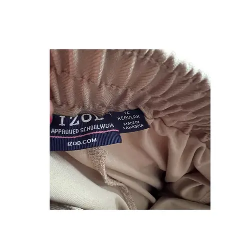 IZOD  {2} school beige pleated skirts with built in shorts. Size 12  on both.