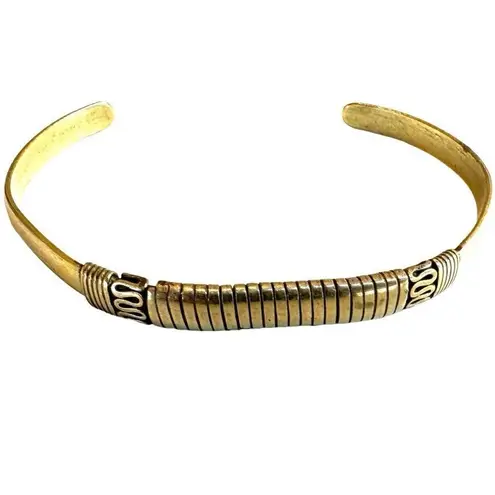 Gold tone etched open cuff bracelet