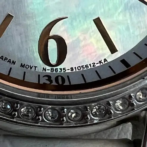 Citizen Eco-Drive Ladies Watch Crystals Pearl Dial Stainless and Rose Gold Dial