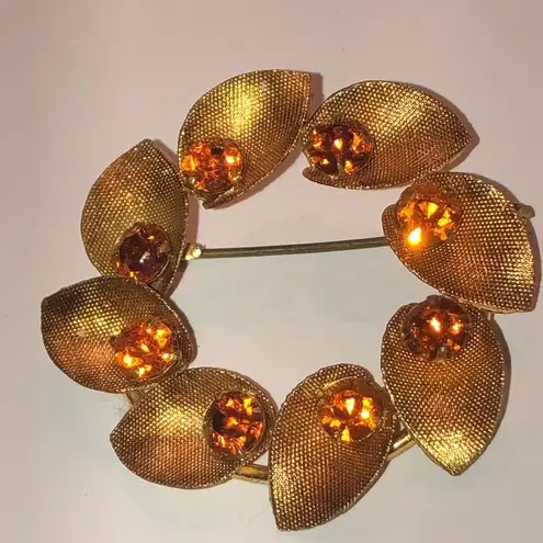 Austria Vintage Gold Tone Amber Color CZ Rhinestone Round Floral Brooch