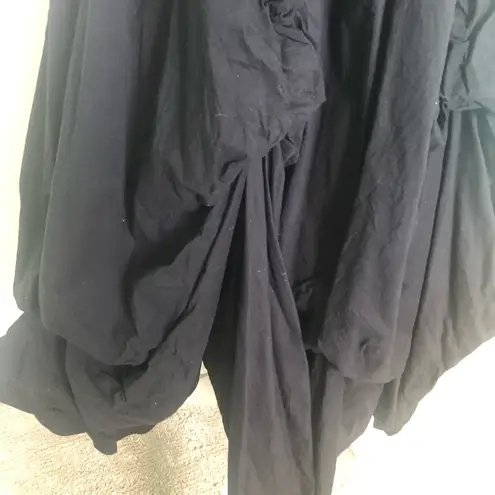 Hemline Black strapless dress with draped .