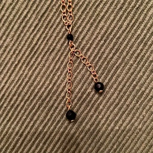 3 necklaces in black, black and gold, black and white colored EUC