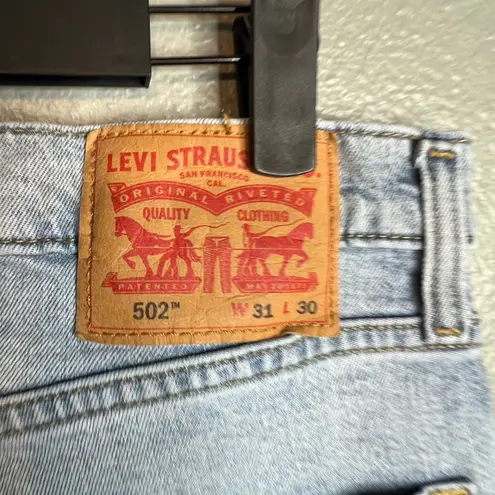 Levis 502 Taper Light Wash Jeans Size 31x30 (Actual 30x28) Blue