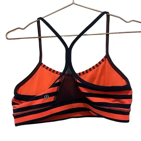 Lululemon  sports flow Y sports bra. Orange & blue stripes. Sea stripes color.