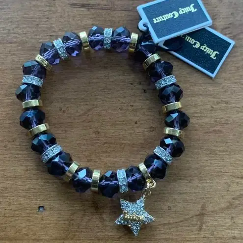 Juicy Couture  Stretch Purple Beaded Bracelet with Dangling Crystal Star Charm