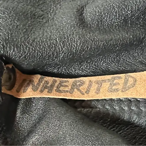 Inherited leather vintage clutch with engraved wood and stud accents Black