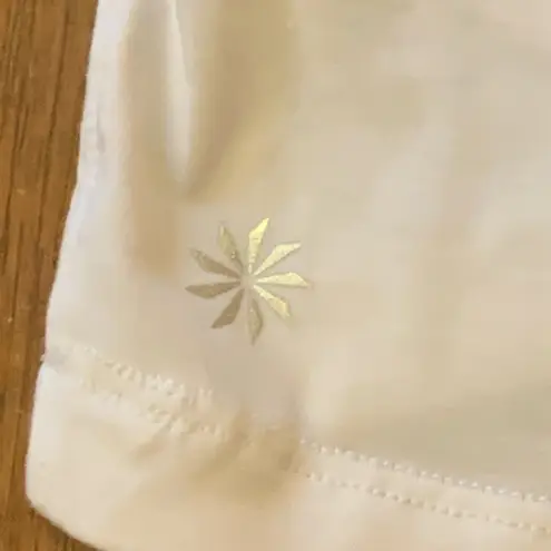 Athleta  short sleeve shirt Small White high low hem detail seam sleeve soft