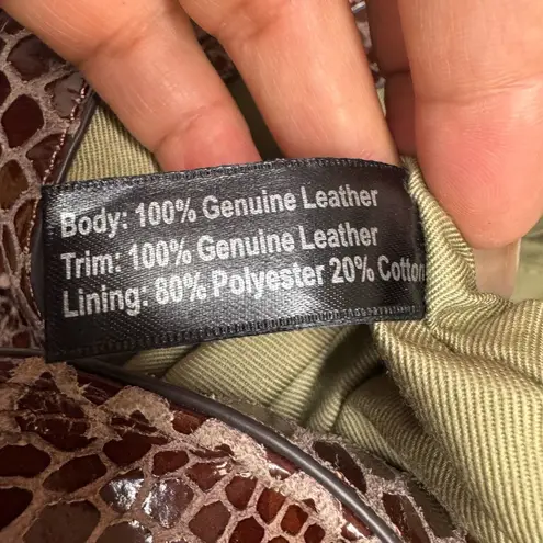 G.I.L.I.Snake Fringe Stirrup Shoulder Red/Brown Patent Suede Bag.