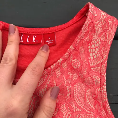 Elle small peplum tip peach & cream colored