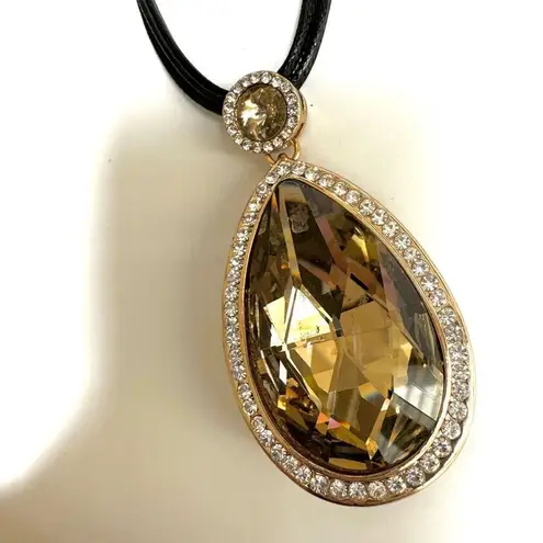Rhinestone teardrop pendant necklace on multi Cord