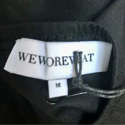 We Wore What NWT Cut Out Midi Skirt Strappy Side Ties Solid Black Cutouts Resort M