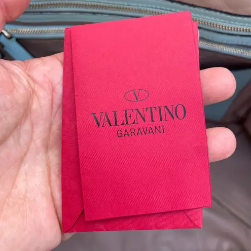 Valentino Garavani Valentino Rockstud medium light blue soft smooth leather shopping tote bag