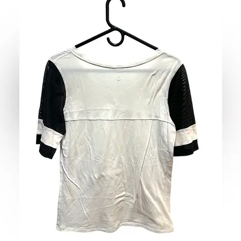 Lululemon  BLACK AND CREAM MESH SLEEVE JERSEY STYLE TOP