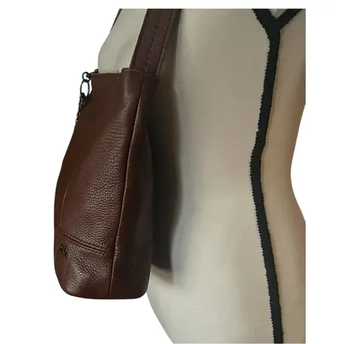 The Sak De Young Pebbled Leather Dangle Charms Shoulder Handbag.