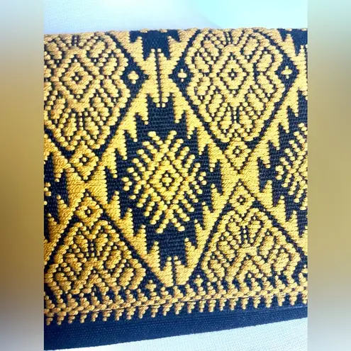 Tribal print and black small clutch black with tassel on the zipper snap closure