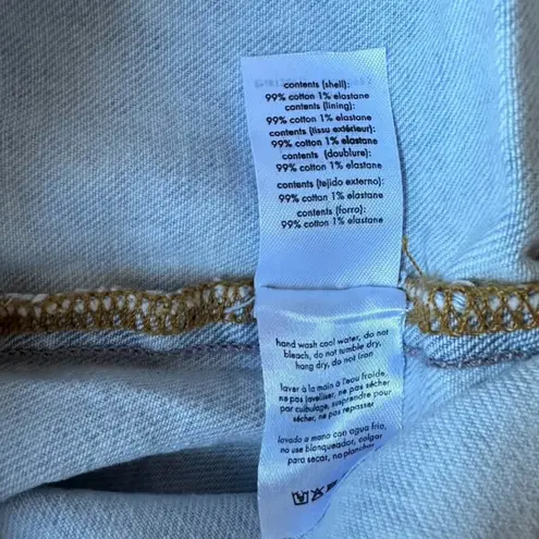 We Wore What cut out mini skirt indigo comfort zrq super light wash denim large