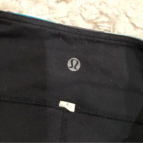 Lululemon  Groove Crop Reversible Yoga Leggings Black Blue 8