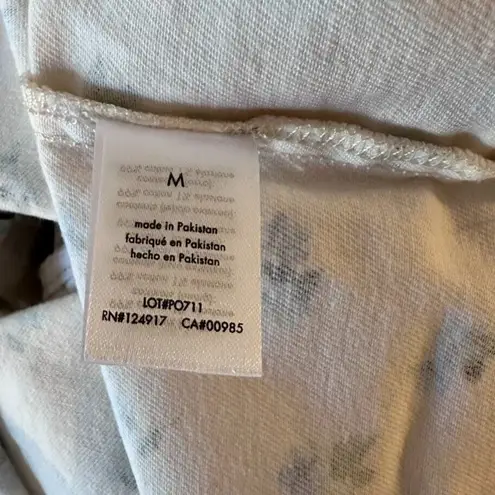 We Wore What cut out mini skirt watercolor ditsy zr5 ivory with blue floral medium