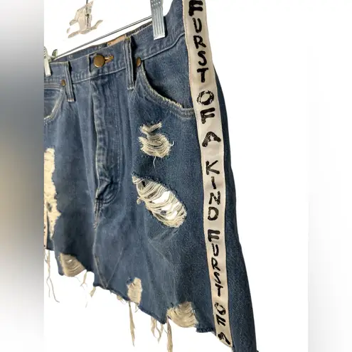 Furst of a Kind  Distressed Denim Skirt with Unique Side Straps - Image 3