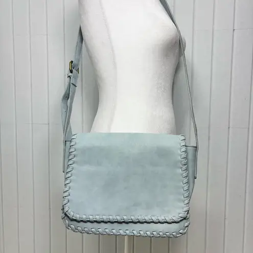 Hayden Harnett crossbody bag in a light blue shade with whipstitch detailing