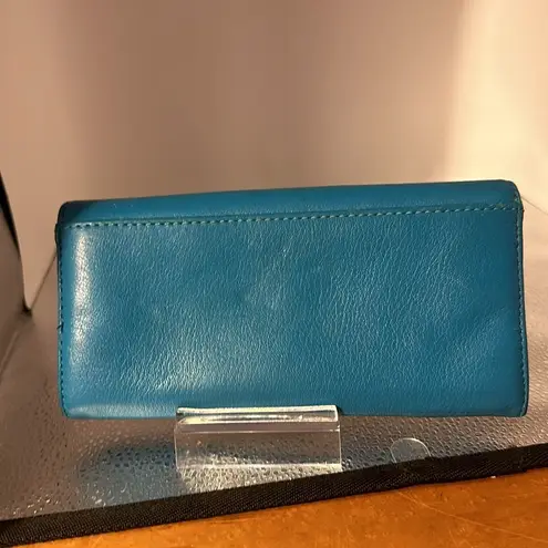Michael Kors , and fair used condition billfold. I took pictures of the callouts​