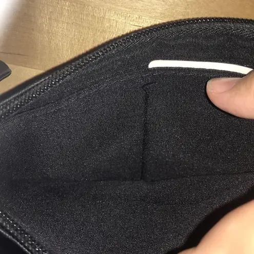 Rosetti wristlet in black faux leather new condition