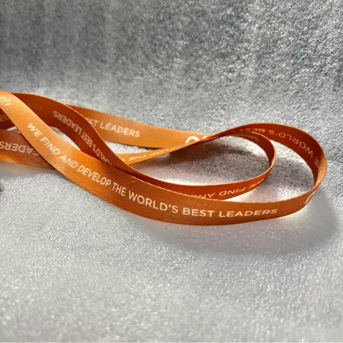 Lanyard N2Growth Orange Spellout We Find and Develop the World's Best Leaders