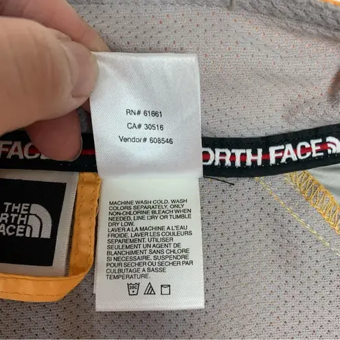 The North Face  women's XL yellow windbreaker lightweight jacket hiking rain repe