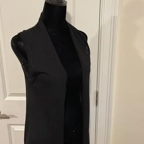 Tahari Black sleeveless sweater. Size XS