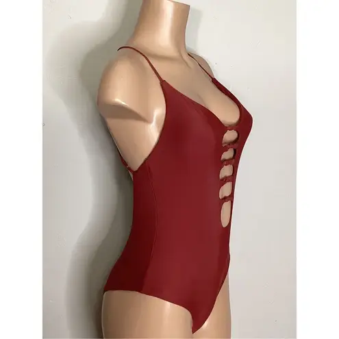 Becca New. knotted one piece. Size medium. Retails $129