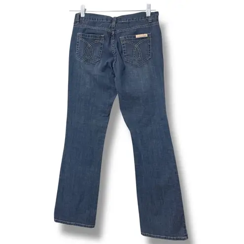 Calvin Klein  size 4 women’s bootcut denim jeans pull on zip button closure